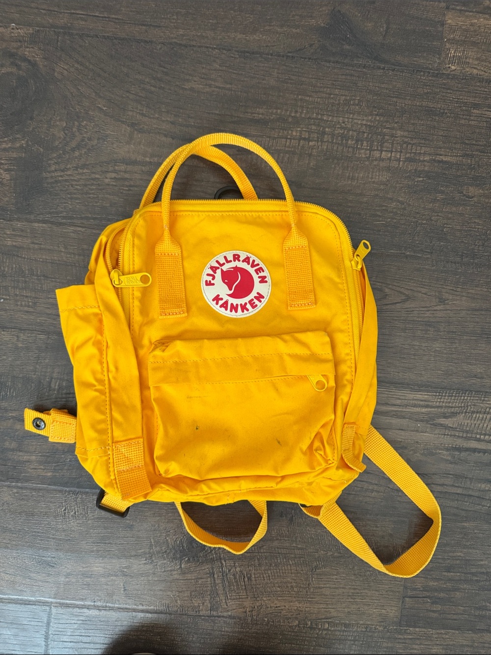 Fjallraven Kånken Mini Backpack in Yellow with Red Logo